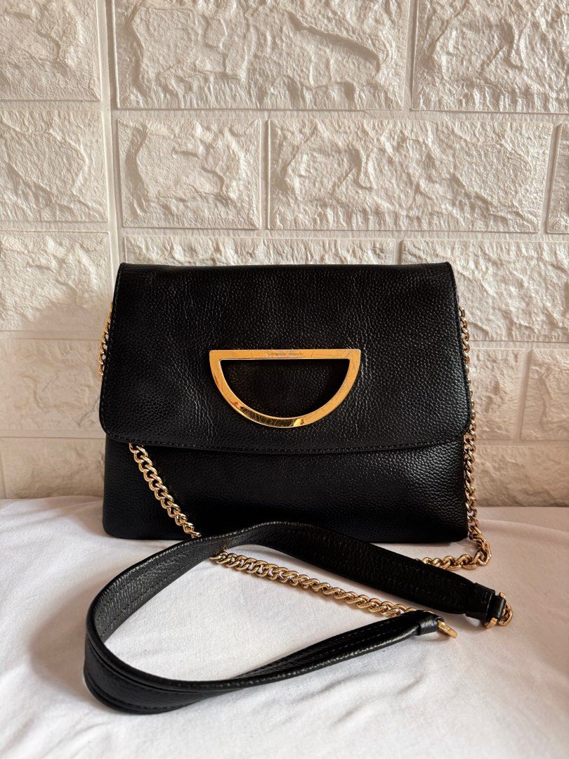 Samantha Thavasa Black Sling Leather (Category: Luxury Bags & Wallets) located in Davao. Submitted by stellietas (Listing ID 1327873509, Image 1). Description: Size: 9.8L x 7.5H x 1.5W inches Color: black Genuine leather, makapal Clean interior Signs of use on hardware: hardware sa front may scratches and faded part see photo posted. With issue sa gilid: small cracks and rubber linning, see photo posted.