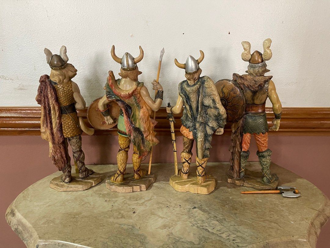 Set of 4 viking figurine (Category: Other Home Decor) located in Manila. Submitted by alduinc (Listing ID 1327732620, Image 2). Description: Set of 4 viking figurines, has flaw on one (missing thumb) but is hidden when holding his axe Needs cleaning 10-11 inches.