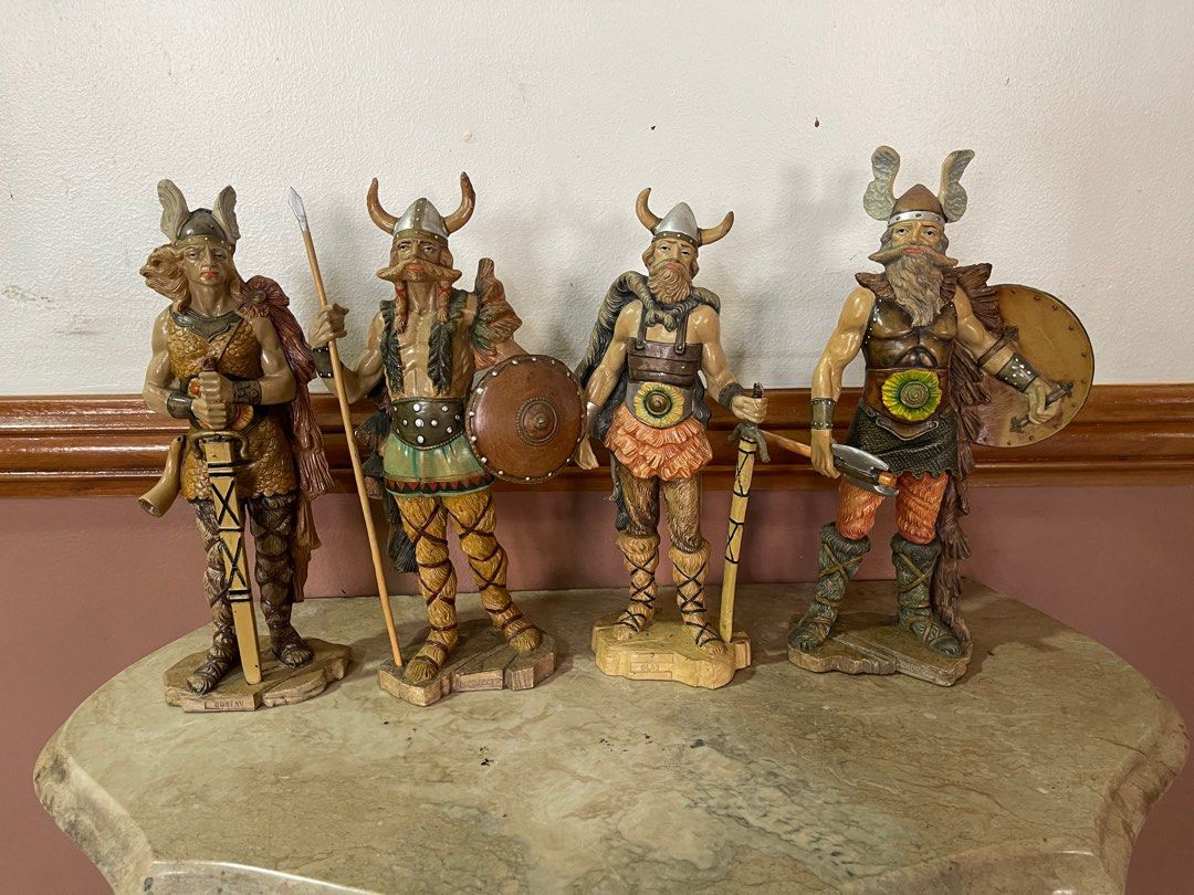 Set of 4 viking figurine (Category: Other Home Decor) located in Manila. Submitted by alduinc (Listing ID 1327732620, Image 1). Description: Set of 4 viking figurines, has flaw on one (missing thumb) but is hidden when holding his axe Needs cleaning 10-11 inches.