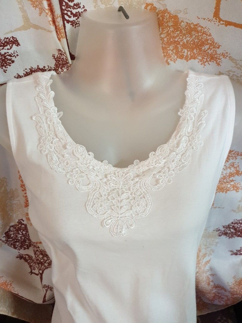 Sleeve less 1 (Category: Everything Else Others) located in Cavite. Submitted by assortedbymickeymouse (Listing ID 1327795120, Image 2). Description: Brand: white stag S: s/l (on tag) color: white.