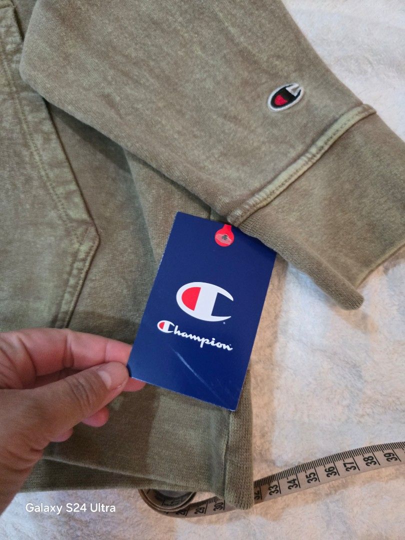 Fake champion hoodie tag online