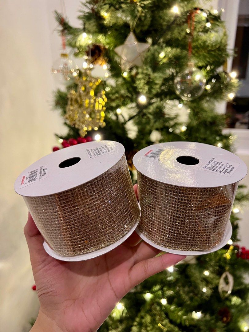 Gold Christmas Ribbons (2 PCS) (Category: Other Home Decor) located in Naga. Submitted by Rveebee (Listing ID 1327991060, Image 2). Description: Gold Christmas Ribbons (2 PCS) ₱400 for 2 pcs Condition - New Please see last photo for the dimensions .