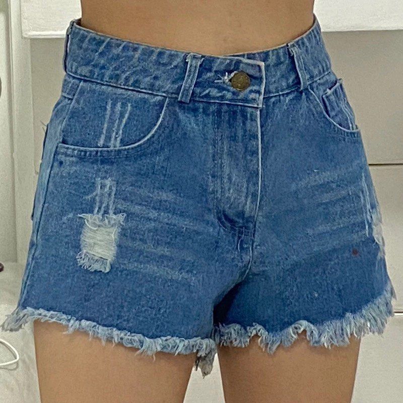 preloved medium wash tattered denim shorts (Category: Shorts) located in Valenzuela. Submitted by selcycle (Listing ID 1328045933, Image 2). Description: msize 📏 • 26 inches condition: • 10/10 • no stains ✿ location: ugong, valenzuela city ✿ mop: gcash or bpi bank transfer ✿ mod: j&t or lalamove ✿ meet up: around morayta/españa message me for more pictures and/or if you have any question 🫶🏻.