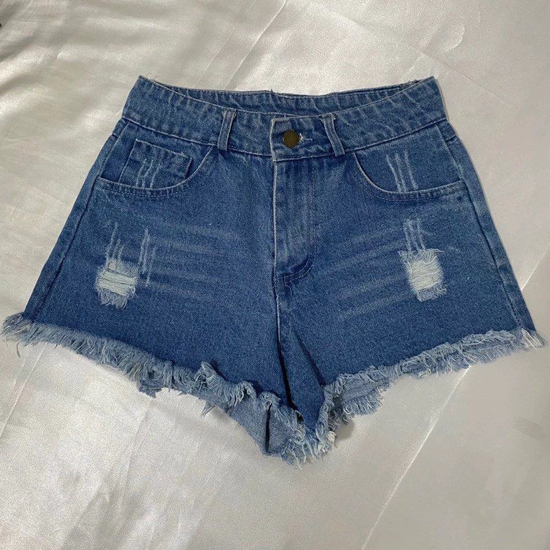 preloved medium wash tattered denim shorts (Category: Shorts) located in Valenzuela. Submitted by selcycle (Listing ID 1328045933, Image 1). Description: msize 📏 • 26 inches condition: • 10/10 • no stains ✿ location: ugong, valenzuela city ✿ mop: gcash or bpi bank transfer ✿ mod: j&t or lalamove ✿ meet up: around morayta/españa message me for more pictures and/or if you have any question 🫶🏻.