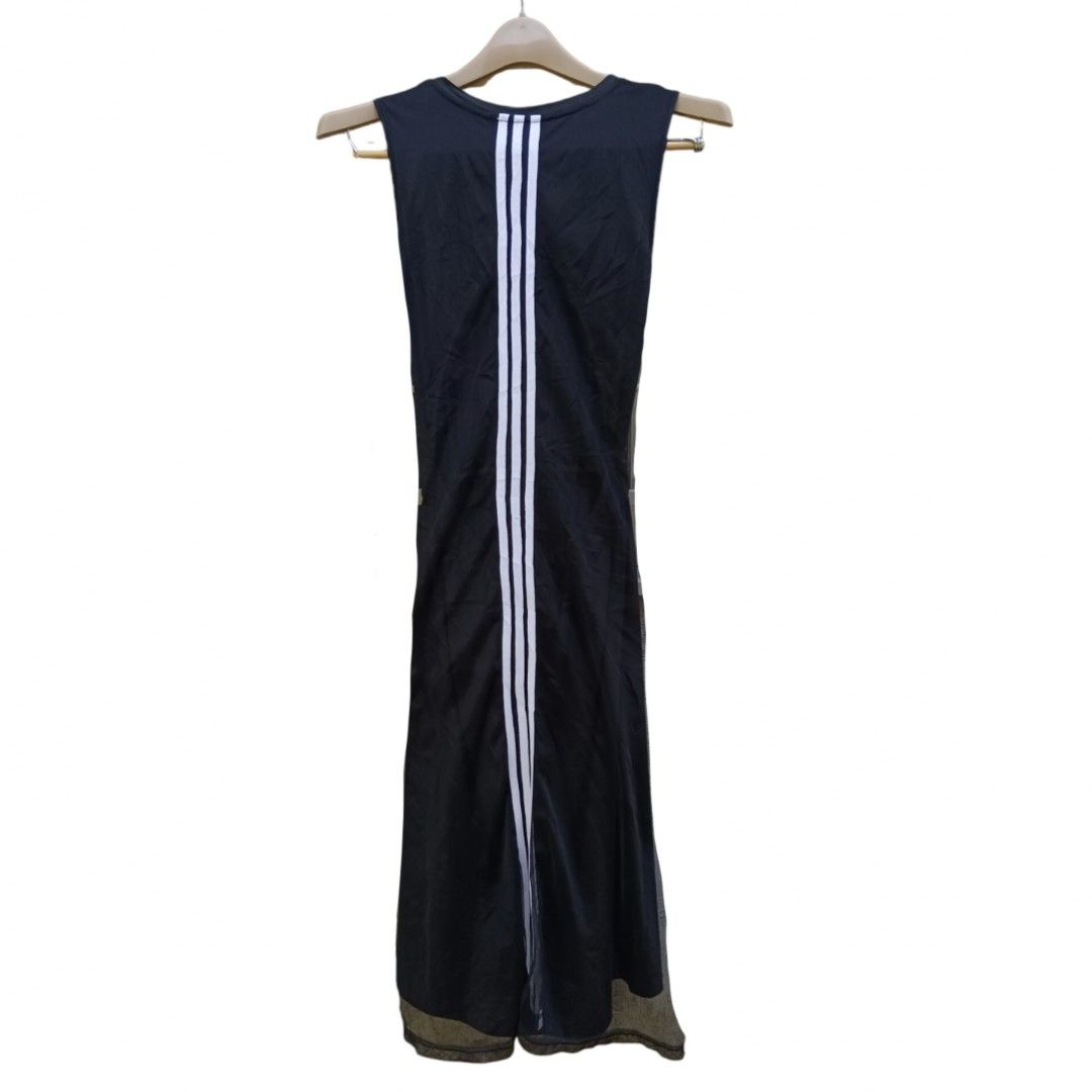 Y-3 Yohji Yamamoto Black Dress (Category: Luxury Apparel) located in Davao. Submitted by jecks9 (Listing ID 1327908832, Image 2). Description: Open back w/ double linen 3 stripes design. shoulders: 13.5 inch armpit: 17 inch shoulder to waist: 15.5 inch waistline: 26-30 inch waist to leg: 27 inch wide opening: 40 inch prestine conditions 9.5/10 colorate see photos for details still presentable to wear MAKE OFFER 📌.