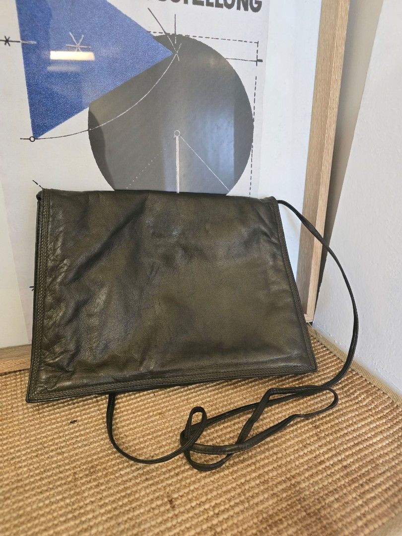 Authentic Loewe sling bag (Category: Luxury Bags & Wallets) located in Pasig City. Submitted by kimjayson (Listing ID 1328138673, Image 2). Description: ‼️Please read‼️ Will not entertain questions that are already posted here. All items are Authentic. I do not, and will never own/sell fake or replicas. -------------------------------- Dimensions - 11x8 inches handle drop - 25 inches (adjustable by tying a not to your preferred length) Location p