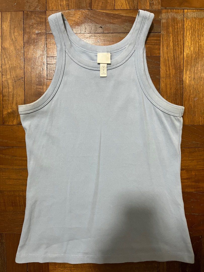 Basic Tops (Category: Sleeveless) located in Singapore. Submitted by jayohwhyy (Listing ID 1328202423, Image 3). Description: Basic versatile tops, all lightly used and still in good condition! Size M Take all for $10. Help me clear please .