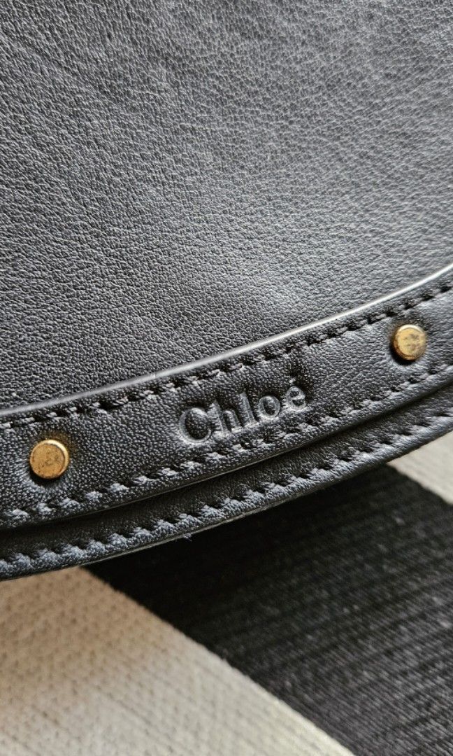 Chloe Nile (Category: Luxury Bags & Wallets) located in Quezon City. Submitted by mamashopfinds (Listing ID 1323953355, Image 3). Description: Body is still good! - No inclusions - hologram still intact but faded - has minor dents in front and at the back due to storage - has signs of usage on the rubber linings - gold wares are tarnished thus, the low price :).