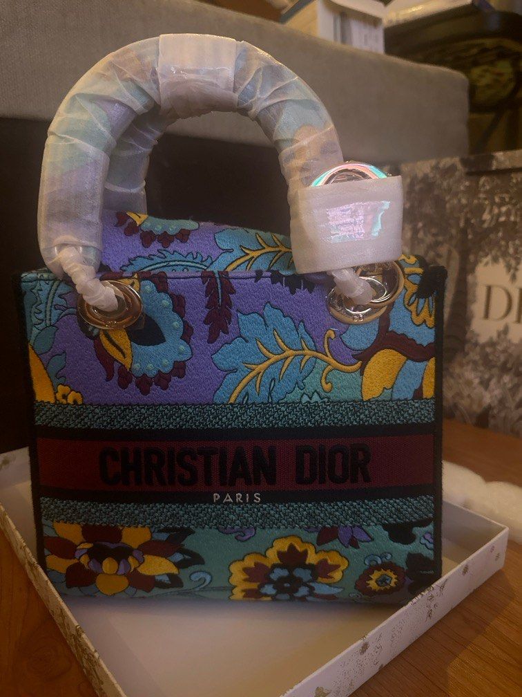 Christian Dior D Lite (Category: Cross-body Bags) located in Makati City. Submitted by luxedeclutter (Listing ID 1299366594, Image 2). Description: Christian Dior D lite Brand New With Dust Bag Box and paper bag and cards .