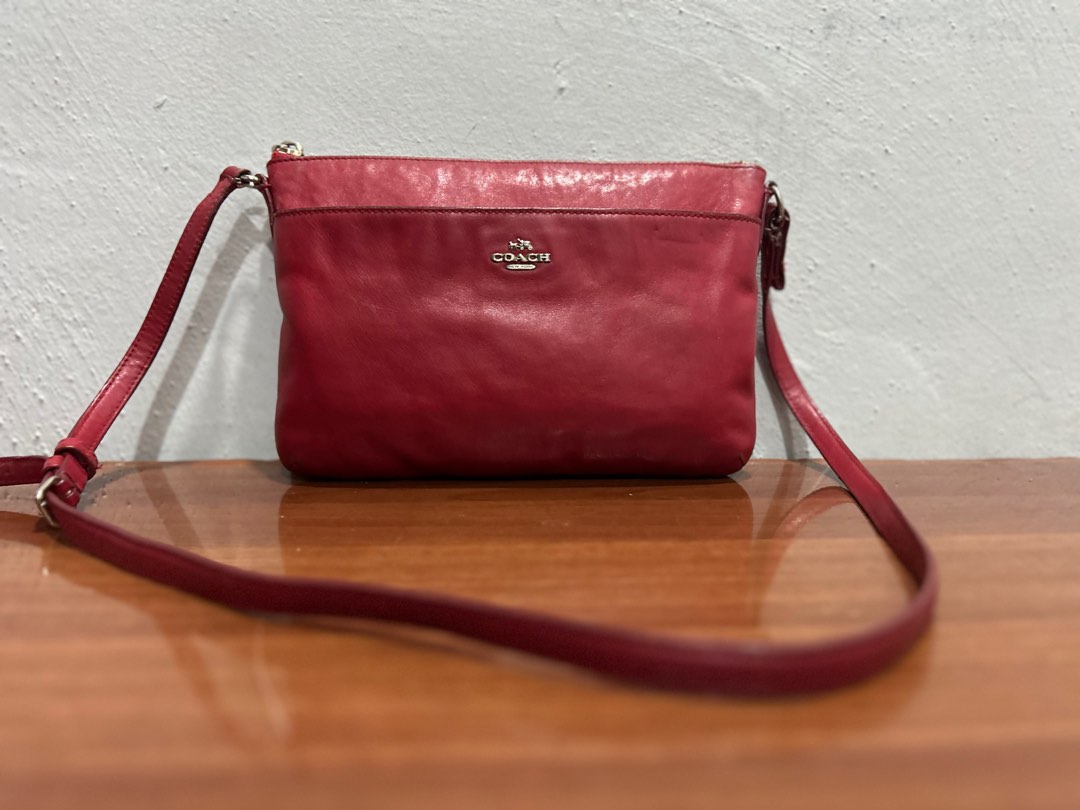 coach red sling bag