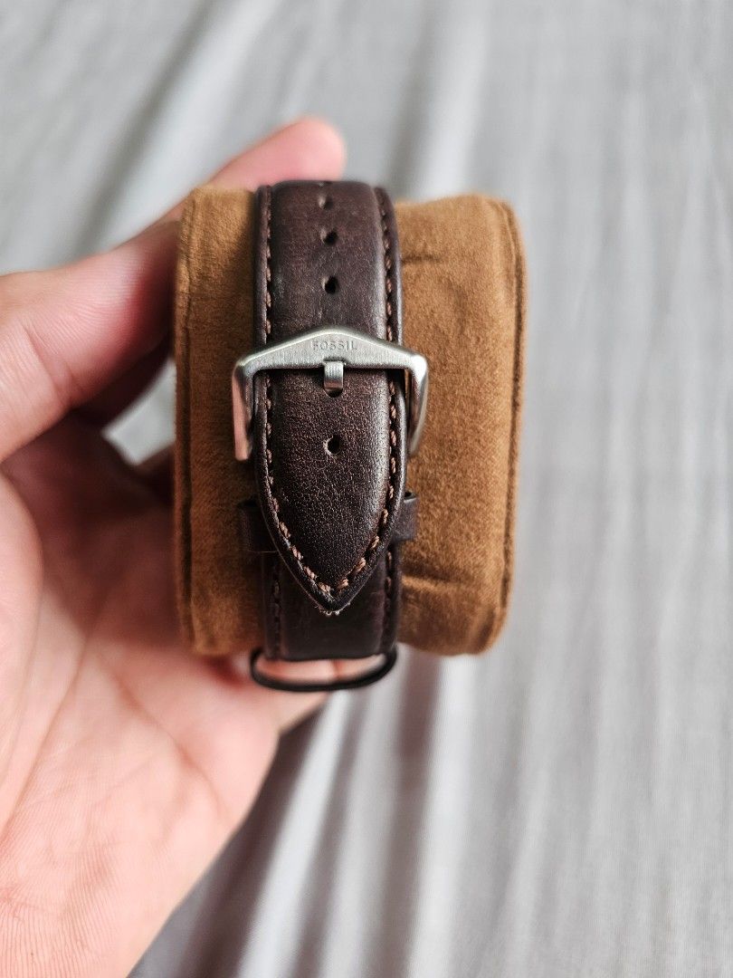 Fossil Tank Dress Watch (Category: Men's Watches) located in Pasig City. Submitted by reyandrew (Listing ID 1328095966, Image 2). Description: Fossil Tank Dress Watch with case and paperworks Good as new rfs: unloading from collection price: 9,000 Php.