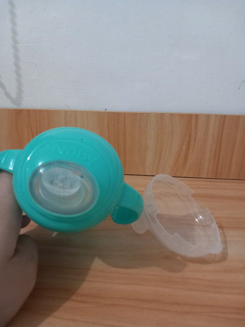 Nuby Training Cup (Category: Weaning & Toddler Feeding) located in Quezon City. Submitted by zntinycloset (Listing ID 1328155103, Image 2). Description: .
