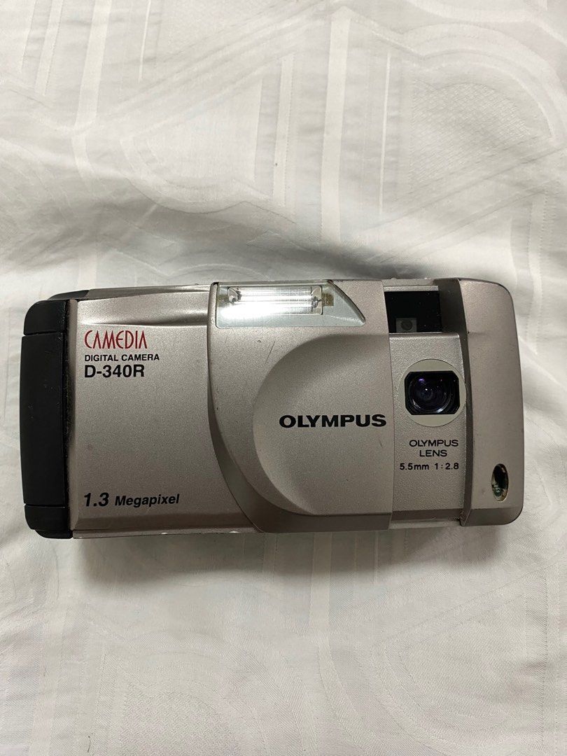 Rare Olympus Camedia D340R Digicam (Category: Cameras) located in Antipolo. Submitted by declutter.clothes (Listing ID 1328070740, Image 2). Description: BUY AT YOUR OWN RISK. Defective, idk kung napapaayos pa bigla na lang hindi nag oon kahit pinalitan ko na ng battery. w CCD sensor (vintage vibe photos) battery: 4x AA battery sample shots posted UNIT ONLY, no sd card and battery included..