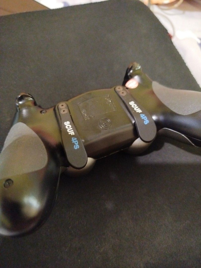 SCUF GAMING Professional PS4 controller w/ Hall Effect (Category: Controllers) located in Marilao. Submitted by calibre027 (Listing ID 1316701444, Image 3). Description: SCUF GAMING Professional PS4 controller w/ Hall Effect 🔥Professional grade controller: hall effect sensor on both thumbsticks for precision 🔥Tall precision thumbsticks (left is dome; right is concave) 🔥2 back paddles (remappable thru PS4 settings) 🔥Ultra Grip handles 🔥 no is