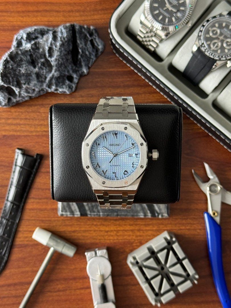 Seiko Ice Blue Arabic Royal Oak Mod Watch (Category: Luxury Watches) located in Quezon City. Submitted by mnl.chll (Listing ID 1328249533, Image 1). Description: Seiko Ice Blue Arabic Royal Oak Mod Watch Case: Stainless steel Weight: 150g for comfortable wear Diameter: 40mm, balanced for most wrists Strap: Stainless Steel Rose Gold with Butterfly Clasp Movement: Seiko NH35A Automatic Mechanical TMI Mode of Payment: BANK/GCASH A ₱2,000 down paymen