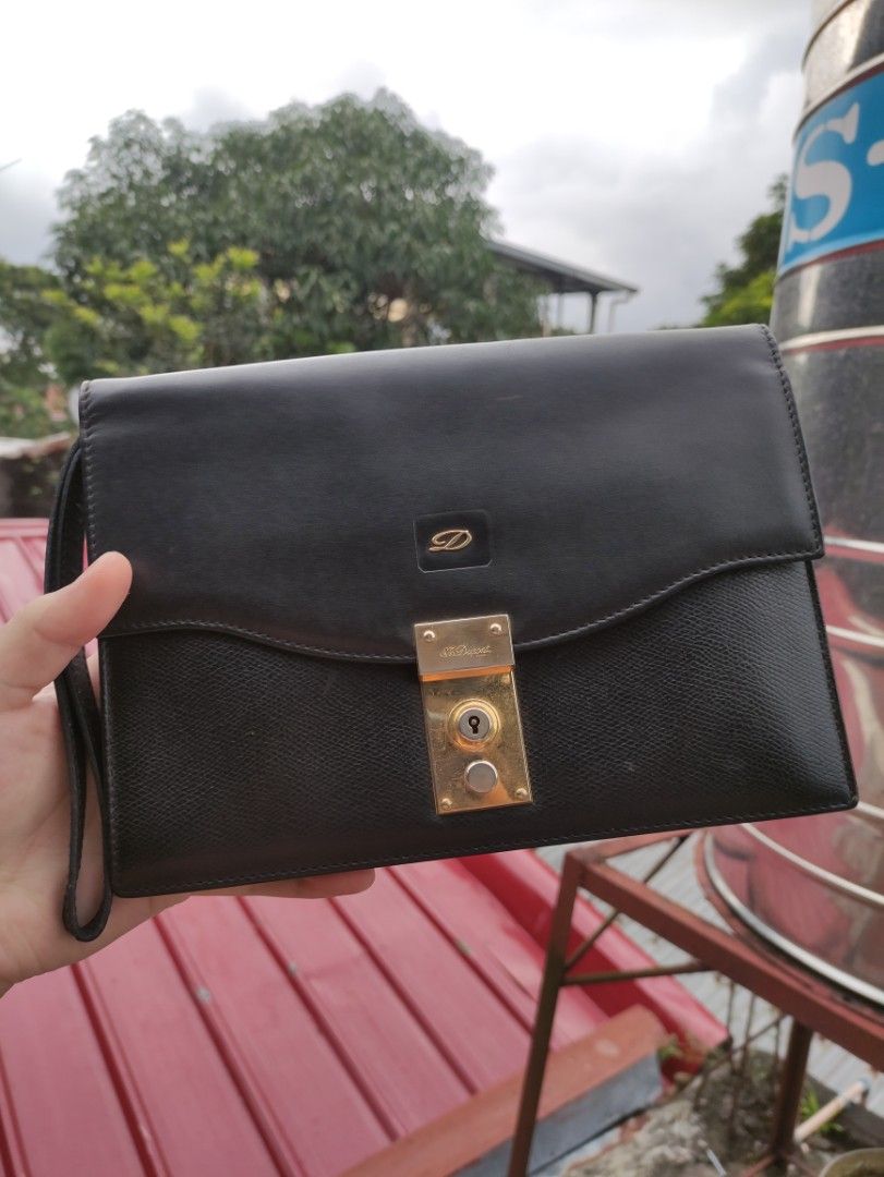 St Dupont clutch bag document bag (Category: Luxury Bags & Wallets) located in Manila. Submitted by maxxxxxxxxxxxx (Listing ID 1328214367, Image 1). Description: for sale nice leather vintage ST Dupont leather clutch bag with key and working lock barely used.