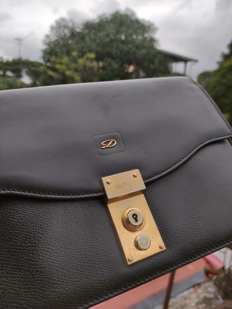 St Dupont clutch bag document bag (Category: Luxury Bags & Wallets) located in Manila. Submitted by maxxxxxxxxxxxx (Listing ID 1328214367, Image 2). Description: for sale nice leather vintage ST Dupont leather clutch bag with key and working lock barely used.