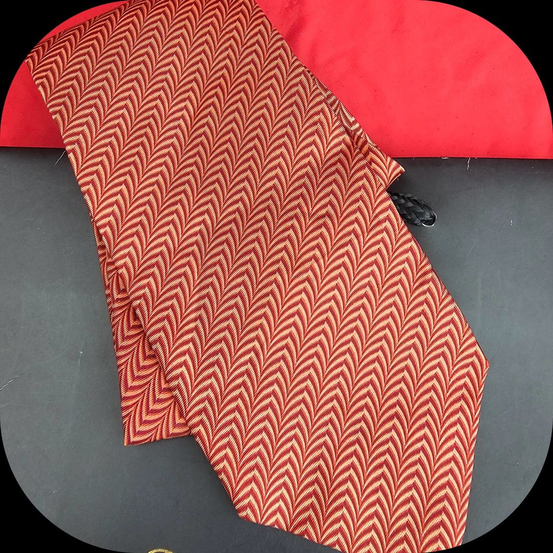 🛑Ysl Brown Orange Silk Neck Tie (Category: Luxury Accessories) located in Baguio. Submitted by bagluxers_haven (Listing ID 1328199597, Image 2). Description: 🛑Authentic Ysl Brownish Orange Wave Pattern Silk Tie 🛑OVERALL CONDITION : 9.8/10 Like New & in Excellent & Flawless Condition but no more box. 🛑MOP : Bpi, Union Bank, Gcash. 🛑Do inquire if you need further assistance..