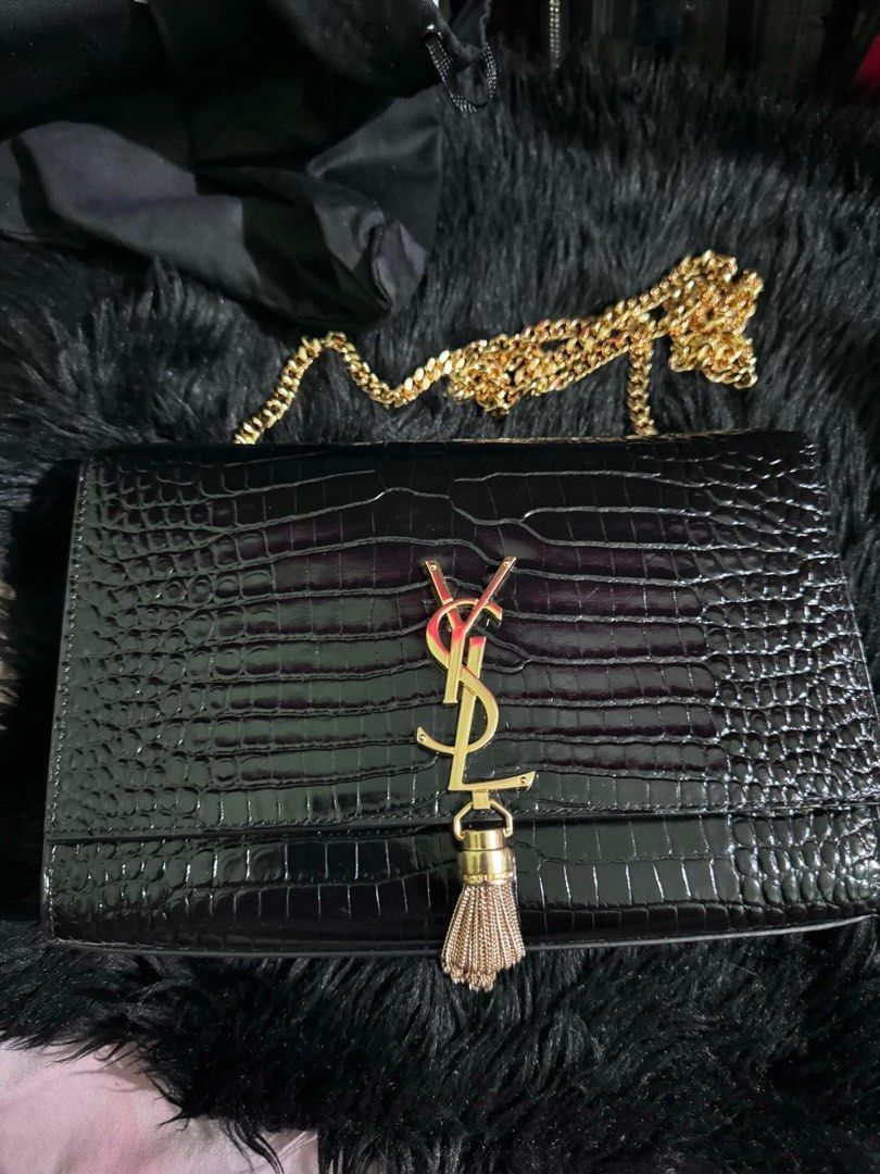 YSL Kate Tassel Croc Embossed Bag (Category: Luxury Bags & Wallets) located in Quezon City. Submitted by randomstuffdeclutter33 (Listing ID 1328097820, Image 1). Description: With dustbag. Lady owned, little scuffings and hardware oxidation. .