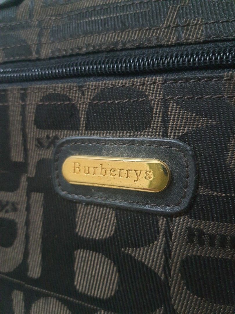 BURBERRY LAPTOP BAG LIGHTWEIGHT (Category: Briefcases) located in Quezon City. Submitted by pinksgate31 (Listing ID 1323643302, Image 2). Description: Hologram, heatstamp,Logo engraved, searchable. Issue sling replaced..