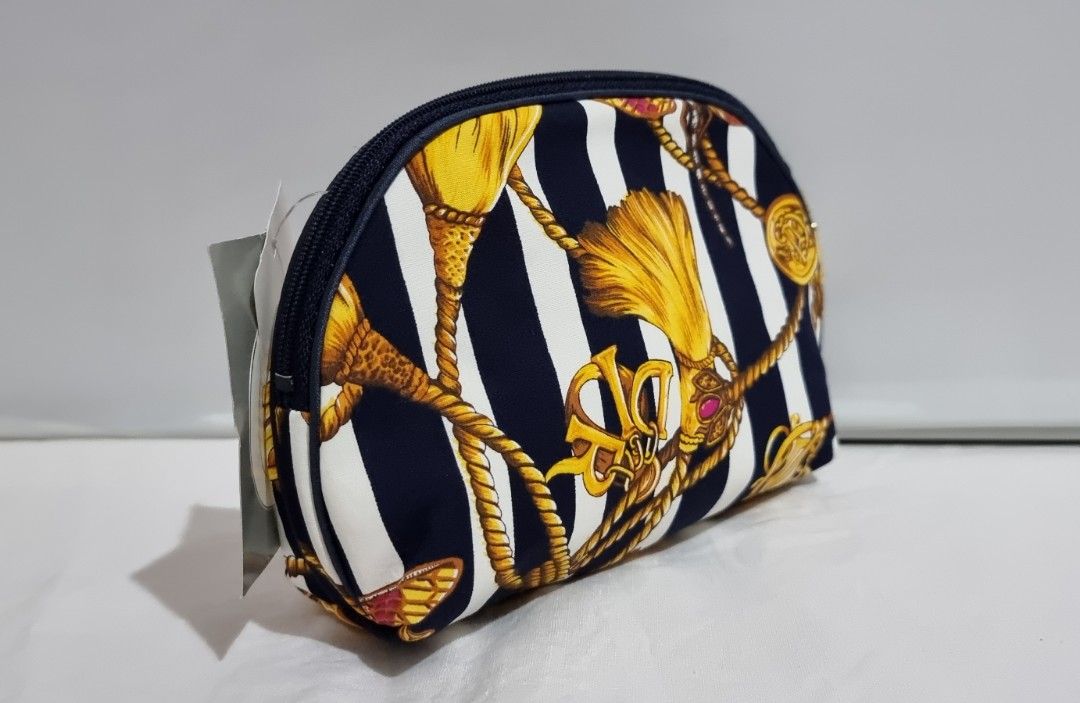 Christian Dior Travel Storage Pouch (Category: Luxury Bags & Wallets) located in Binangonan. Submitted by c_r_i_s (Listing ID 1323554249, Image 3). Description: Christian Dior Travel Storage Pouch Authentic Vintage Dragonfly and Tassel design Dimensions: In excellent condition Made in the USA.