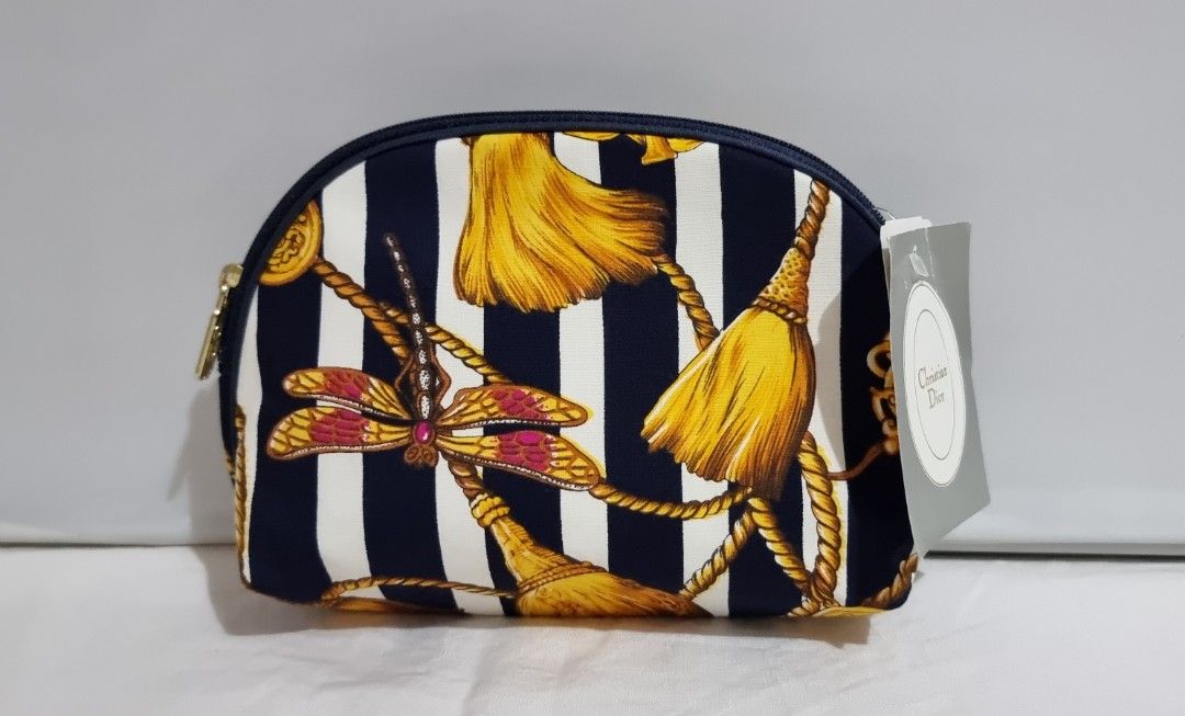 Christian Dior Travel Storage Pouch (Category: Luxury Bags & Wallets) located in Binangonan. Submitted by c_r_i_s (Listing ID 1323554249, Image 1). Description: Christian Dior Travel Storage Pouch Authentic Vintage Dragonfly and Tassel design Dimensions: In excellent condition Made in the USA.