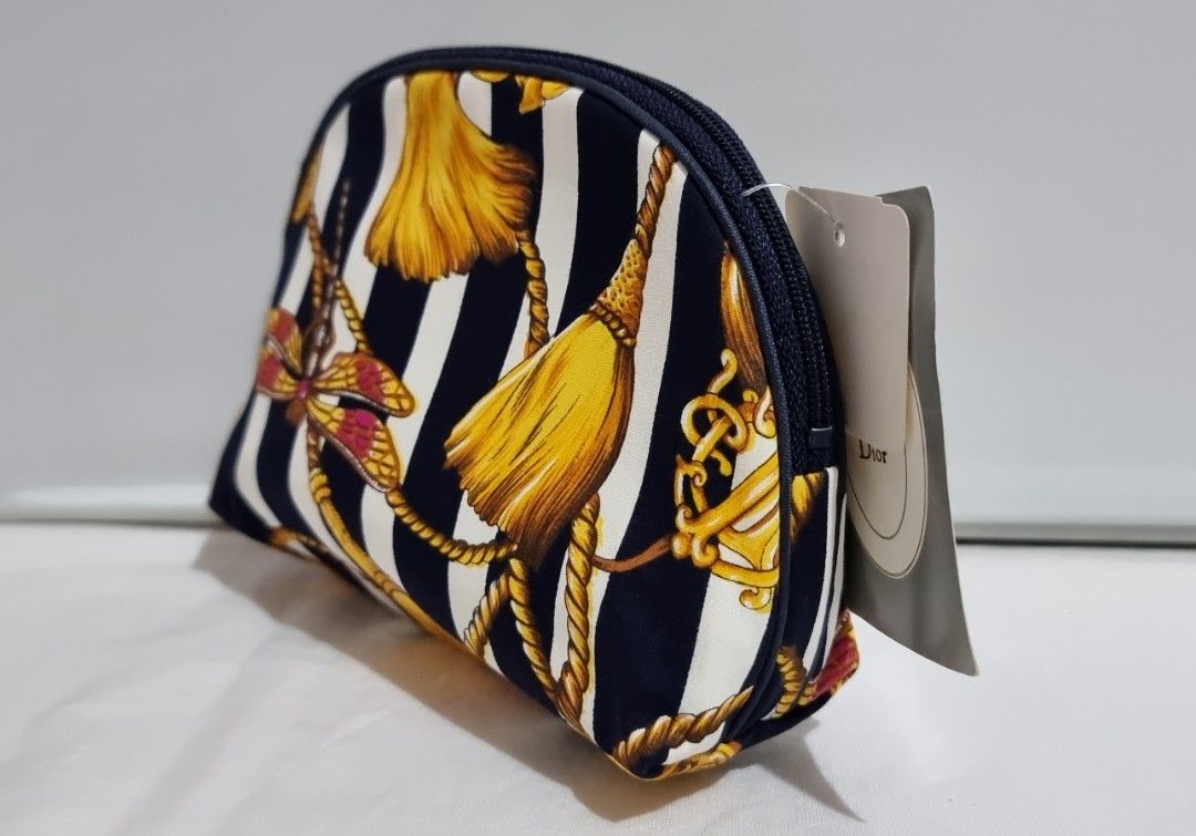 Christian Dior Travel Storage Pouch (Category: Luxury Bags & Wallets) located in Binangonan. Submitted by c_r_i_s (Listing ID 1323554249, Image 2). Description: Christian Dior Travel Storage Pouch Authentic Vintage Dragonfly and Tassel design Dimensions: In excellent condition Made in the USA.