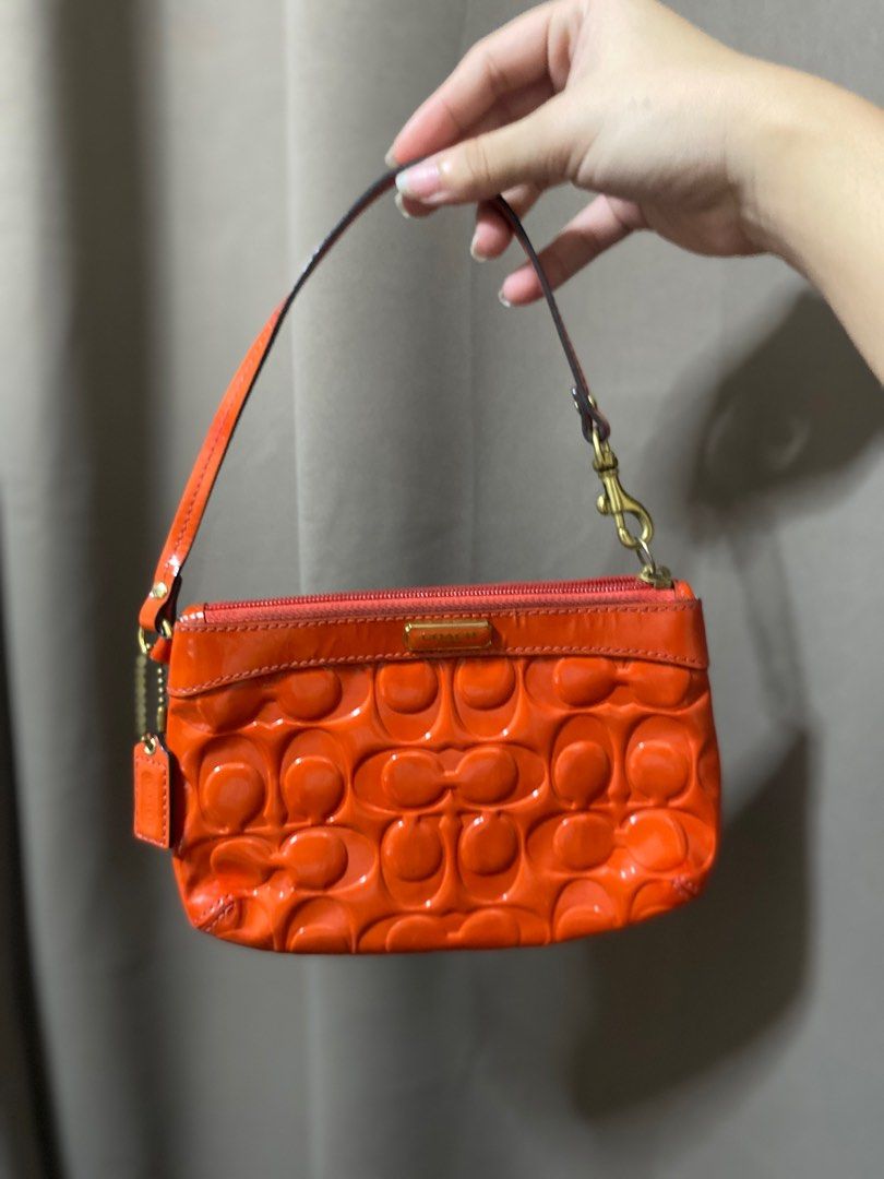 Coach Orange Pouch (Category: Purses & Pouches) located in San Juan City. Submitted by loveduseditems (Listing ID 1323512996, Image 3). Description: .