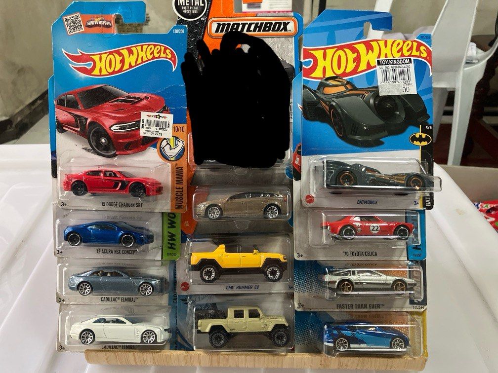 GIFT IDEAS! - Hotwheels & Matchbox Set (Assorted) (Category: Vehicle & Diecast Models) located in Quezon City. Submitted by oncelovedph (Listing ID 1322424266, Image 1). Description: Soft corners. Never been opened. ONLY 125php per model! > Matchbox: Volvo Station Wagon > Hotwheels: JEEP Rubicon, Batmobile, Toyota Celica, Delorean (stock Back to the Future), Hyundai Genesis Coupe .
