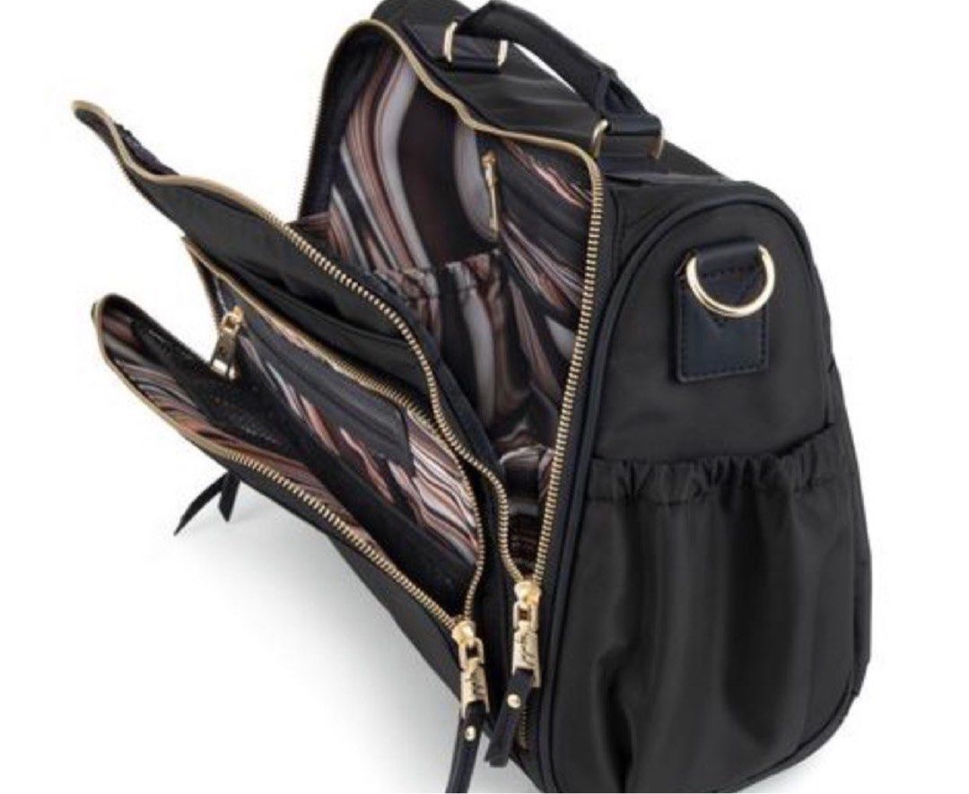 Jujube Eco BFF - Black (Category: Diaper Bags & Wetbags) located in Quezon City. Submitted by maorro (Listing ID 1323534663, Image 2). Description: Another industry first by JuJuBe! Recycled from single use plastic bottles, JuJuBe’s eco-friendly diaper bags turn “waste into want”! How does it work? Single use plastic bottles are responsibly converted into fibers and then woven into luxurious fabrics. Recycled yet refined … we proudly introduce Th