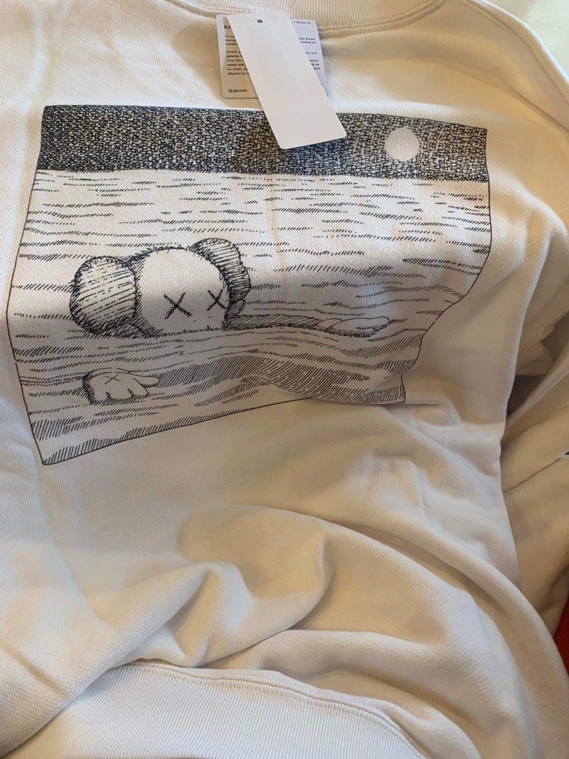 KAWS Long Sleeve Sweatshirt XXL (Category: Coats, Jackets and Outerwear) located in Imus. Submitted by krabmeat (Listing ID 1270899166, Image 2). Description: KAWS Long Sleeve Sweatshirt Product ID467395 Color01 OFF WHITE SizeUnisex XXL (2) SizeUnisex XL.