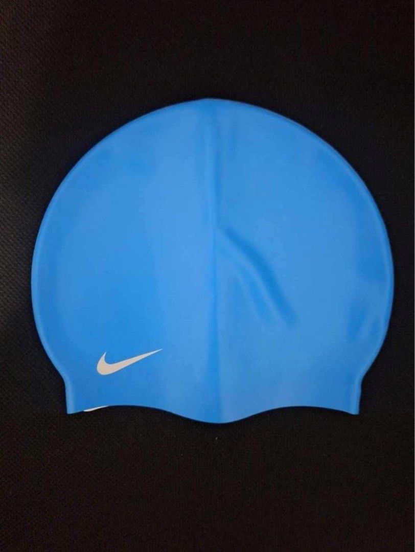 Nike Silicone Youth Swim Cap (Category: Water Sports) located in Paranaque City. Submitted by mavconst (Listing ID 1323571174, Image 1). Description: - Wrong size bought, never been used - fits 8-14 ages .
