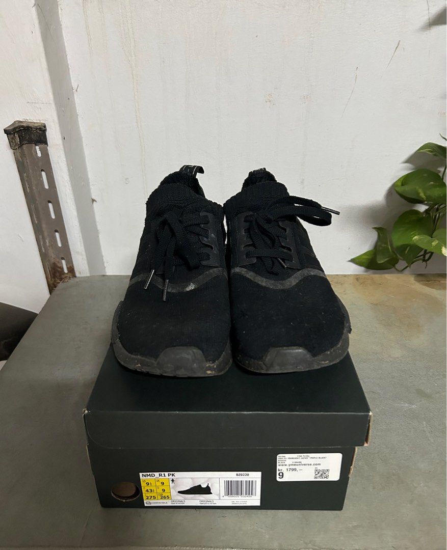 Nmd triple black primeknit discount