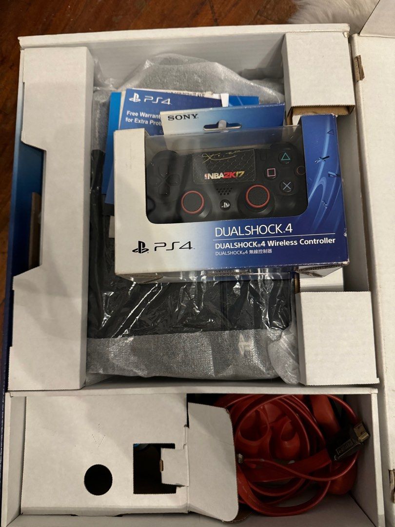 PS4 (Category: PlayStation) located in Quezon City. Submitted by lizellescloset (Listing ID 1323634831, Image 3). Description: PS4 With Box - 2 controllers with rubber cases - Playstation Camera - HDMI Cable - Stand.