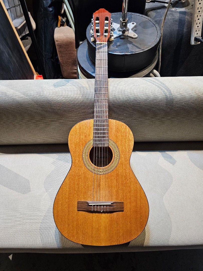 Samick Junior Classical Guitar Model: LC-006G Made in Indonesia (Category: Musical Instruments) located in Guiguinto. Submitted by eypee_knows (Listing ID 1323628373, Image 1). Description: Samick Mini Classical Guitar Model-LC-006G Made in Indonesia Excellent Condition With original samick guitar bag With free brandnew set of strings.