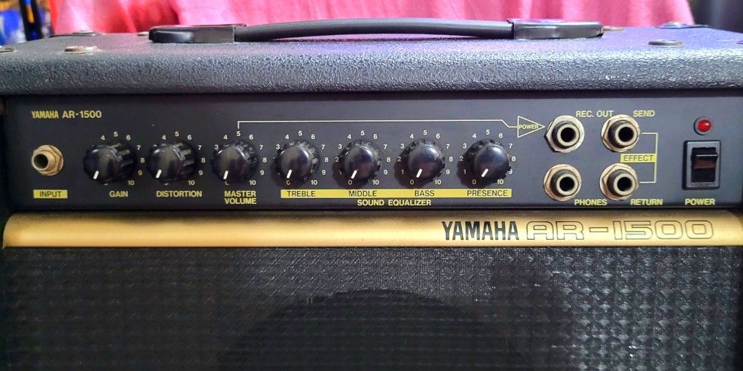 YAMAHA AR-1500 (Guitar Amplifier) (Category: Soundbars, Speakers & Amplifiers) located in Marilao. Submitted by khilluwa (Listing ID 1323639494, Image 2). Description: YAMAHA AR-1500 (Guitar Amplifier) 3,800php Specs: ⚠️⚠️100 VAC⚠️⚠️ 25 Watts 39cm X 20.5cm X 33cm (LxWxH) Features Gain Control Distortion Control Master Volume Control Treble Control Middle Control Bass Control Presence Control Phone Jack Input Phone Jack Output (head Phone) Phone J