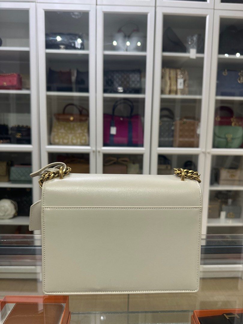 YSL Sunset White Medium Smooth Leather Bag (Category: Luxury Bags & Wallets) located in Taguig. Submitted by closetcompany (Listing ID 1323529999, Image 3). Description: YSL Sunset White Medium Smooth Leather Bag 🫧Php 95,000 🫧CONDITION: Pristine condition with few hairline scratches on the hardwares and small press marks under the flap 🫧RATING: 9.5/10 🫧INCLUSIONS: dust bag, box, paper bag, store receipt, ribbon, clochette, care manuals & info