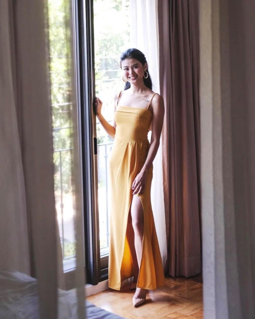 Apartment Eight Ariahs Gown (Category: Evening dresses & gowns) located in Antipolo. Submitted by andyroid (Listing ID 1328274758, Image 1). Description: Only worn once! Original price: PHP 3,980 Size: Small (size chart in gallery) Color: Mustard Stretchable fabric, very comfortable Flaw: Unnoticeable minor fabric pilling on skirt back (see photo) Apartment Eight listing: https://apartment8clothing.com/collections/gowns/products/ariahs-gown?varia