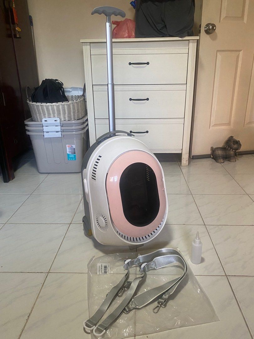 Cat Carrier multi function (Category: Homes & Other Pet Accessories) located in Singapore. Submitted by sellerc (Listing ID 1328252172, Image 1). Description: This lightly used cat carrier is versatile can be carried like a luggage, backpack and even hand carrying. There’s even air circulation and cooling system inside etc. Used only twice, letting go as I have too many carriages. .
