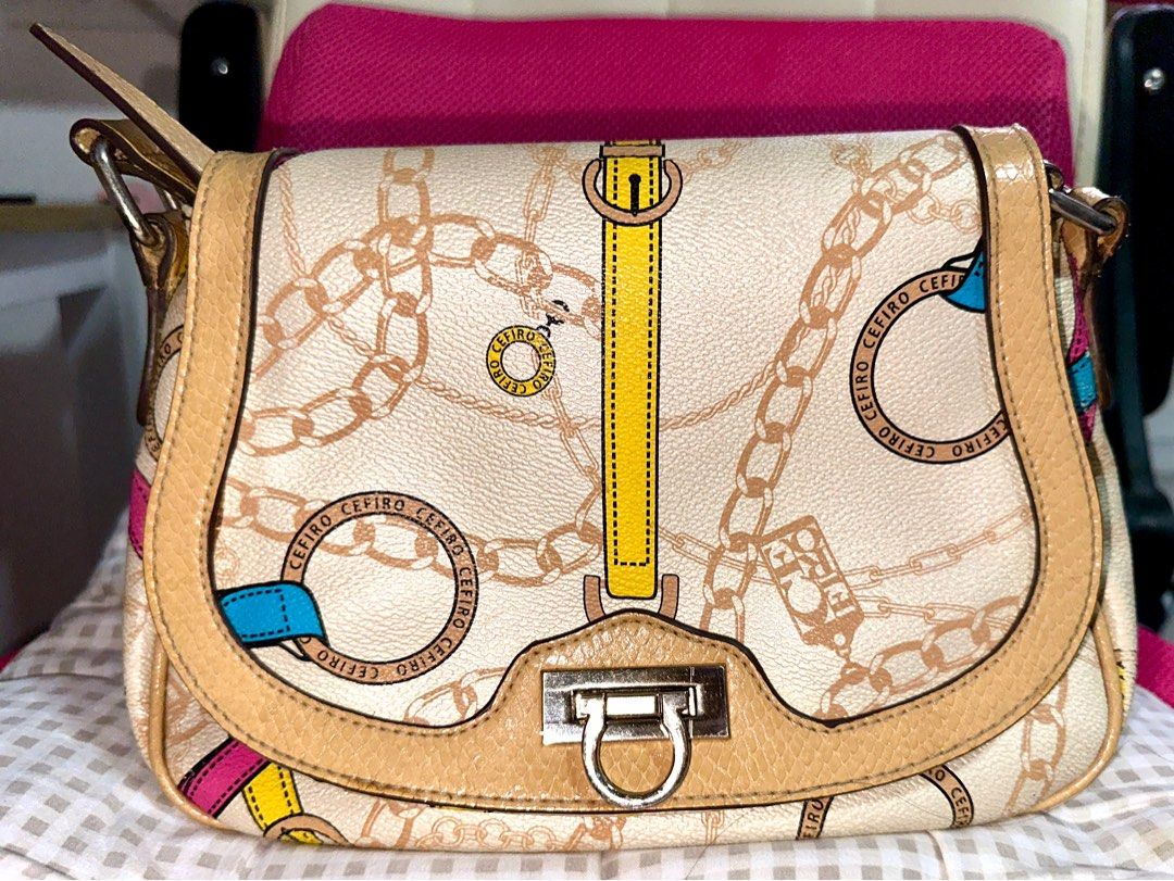 CEFERO SLING LEATHER BAG - PRELOVED (Category: Luxury Bags & Wallets) located in Cainta. Submitted by mapc18 (Listing ID 1328326292, Image 1). Description: MINIMAL FLAWS / VERY UNOTICEABLE FLAWS THIS IS CONSIDERED VINTAGE ORIGINAL BAG With signs of usage ofcourse this is a vintage bag - NEEDS CLEANING ONLY WHAT YOU SEE IS WHAT YOU GET. SLIGHTLY HEAVY SINCE IT’S LEATHER COMPARED TO SYNTHETIC LEATHERS .