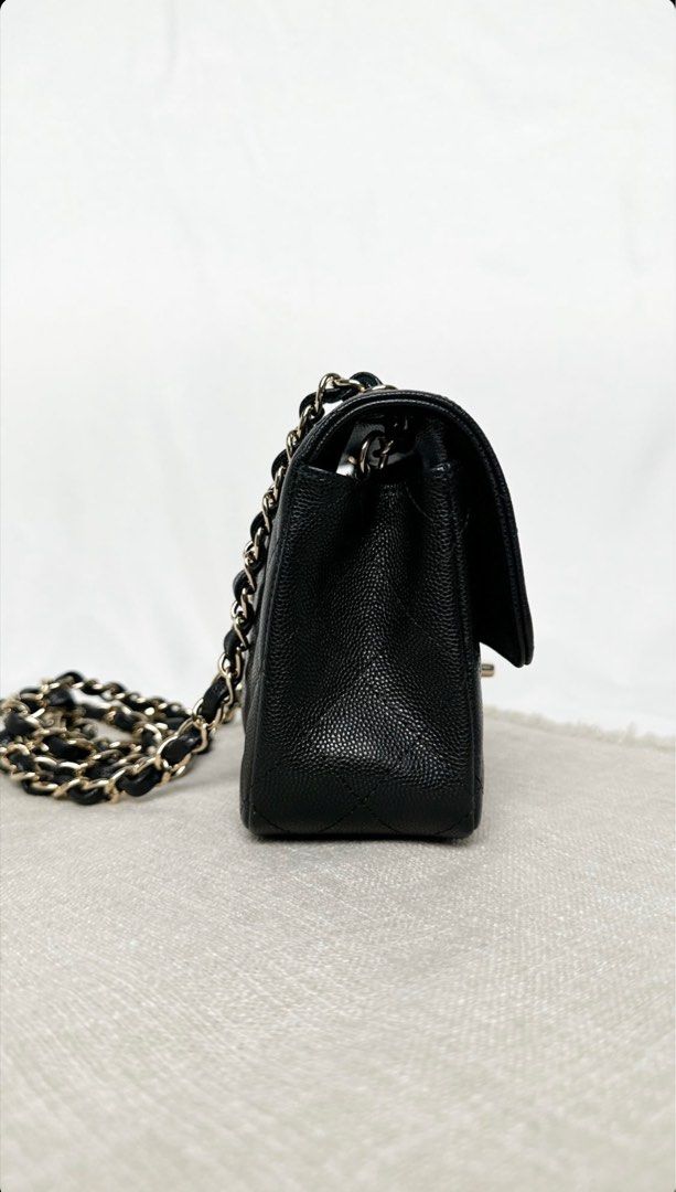 Chanel mini rectangular caviar (Category: Bags & Wallets) located in Singapore. Submitted by shelterme (Listing ID 1328294470, Image 3). Description: Discontinued since 2018. Exterior: excellent condition (close to brand new), with a well-maintained structure, clean corners and base Interior: clean, no stains or smell Accessories: full set with box, dust bag, authenticity card (series 23) & entrupy cert.