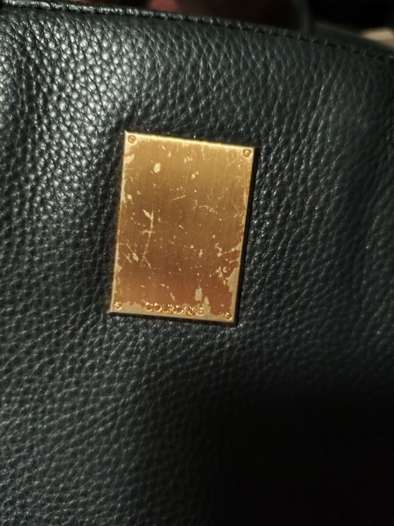 Couronne 2 wag bag (Category: Luxury Bags & Wallets) located in San Fernando. Submitted by brandeddeclutter. (Listing ID 1328295894, Image 3). Description: black couronne bag genuine leather with sign of use s handle part no major flaws.