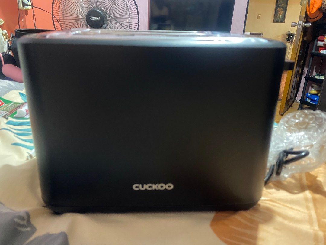 Cuckoo Toaster (Category: Bakeware) located in Pasig City. Submitted by lhenski27 (Listing ID 1328308596, Image 2). Description: Korean brand Cuckoo toaster with defrost and reheat function. Detachable dust cover/crumb tray..