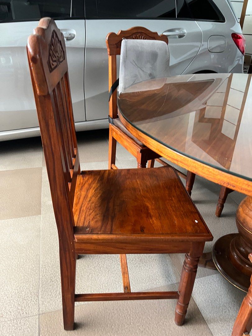 Dinning Table set with 5 chairs Teak Wood (Category: Tables & Sets) located in Quezon City. Submitted by Troy21115 (Listing ID 1328290596, Image 2). Description: Antique Teak Wood Dinning Table With 5 chairs The item is Antique, More than 30 years already Very solid and durable Dinning table RFS: decluttering.