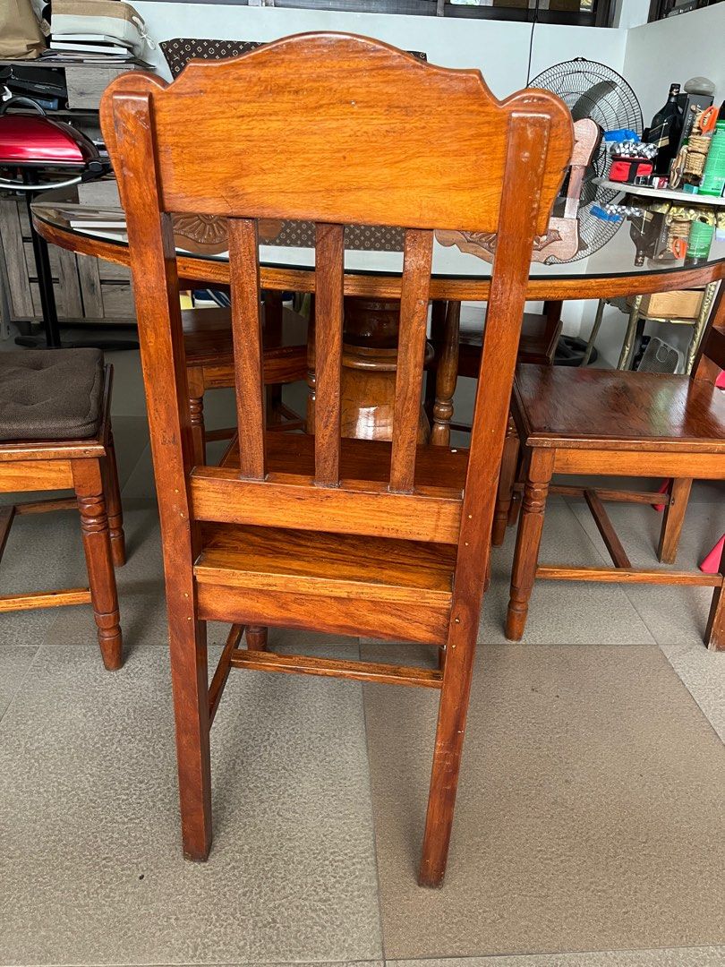 Dinning Table set with 5 chairs Teak Wood (Category: Tables & Sets) located in Quezon City. Submitted by Troy21115 (Listing ID 1328290596, Image 3). Description: Antique Teak Wood Dinning Table With 5 chairs The item is Antique, More than 30 years already Very solid and durable Dinning table RFS: decluttering.