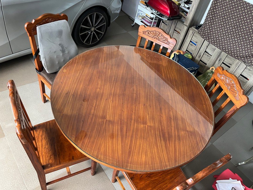 Dinning Table set with 5 chairs Teak Wood (Category: Tables & Sets) located in Quezon City. Submitted by Troy21115 (Listing ID 1328290596, Image 1). Description: Antique Teak Wood Dinning Table With 5 chairs The item is Antique, More than 30 years already Very solid and durable Dinning table RFS: decluttering.