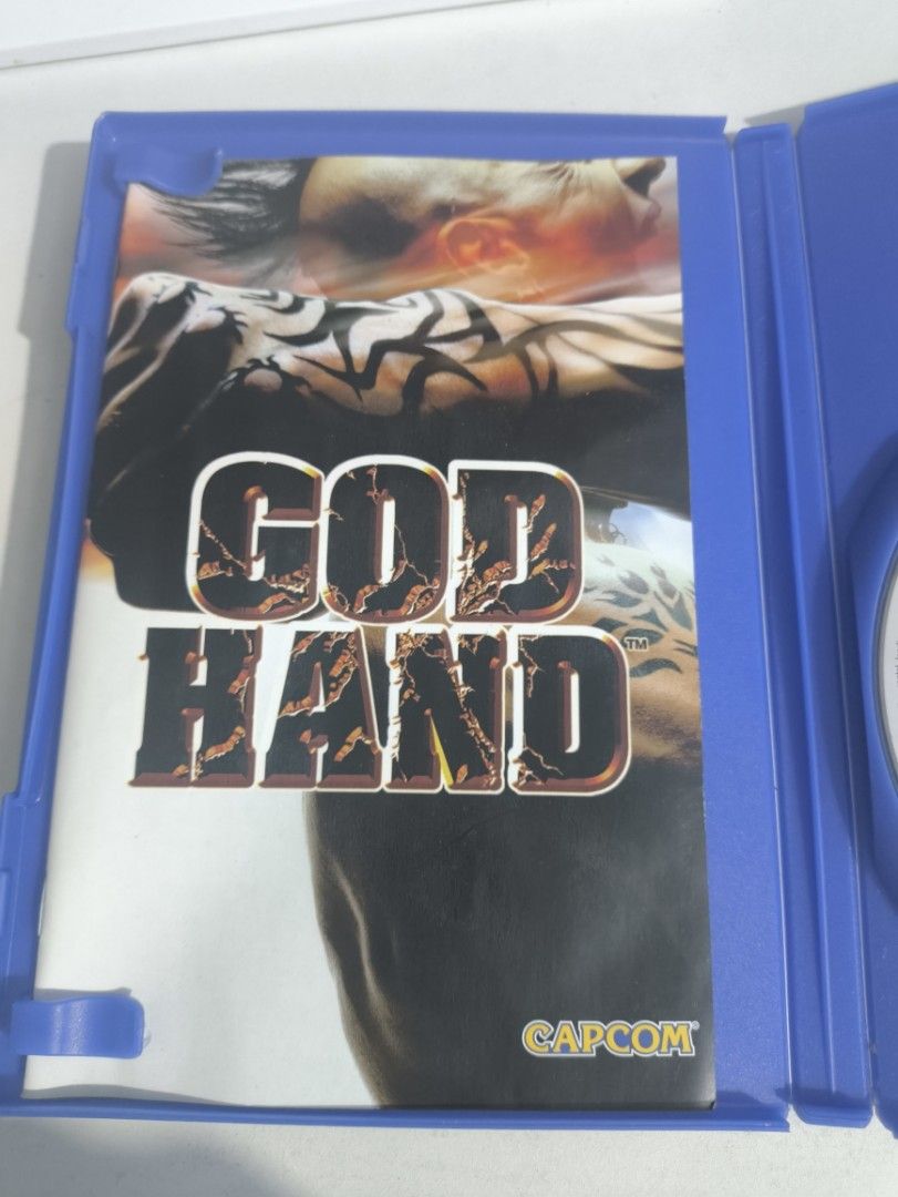 God Hand Ps2 Game(RARE!!!🫣🔥)(WORKING!!) (Category: PlayStation) located in Bangued. Submitted by mastershipper (Listing ID 1328409028, Image 3). Description: God Hand PS2 for only ₱5,000🫣🔥 A must have for collectors🔥 This game is already rare and hard to find🫣 current market value is ₱7,000-₱8,000, you may check online how much one is being sold and how rare this game is. -The disc is still in a very good condition, with few light scratches