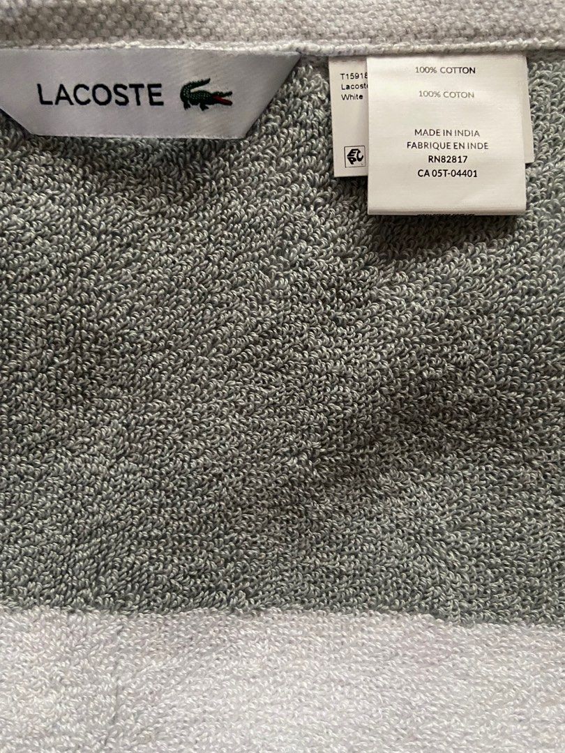 Lacoste bath towel (Category: Bath) located in Bacoor. Submitted by scmom (Listing ID 1328285369, Image 2). Description: Bought in US White and gray color.