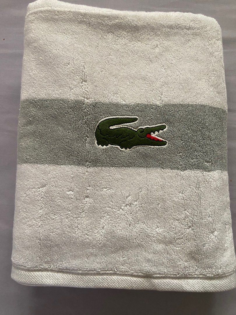 Lacoste bath towel (Category: Bath) located in Bacoor. Submitted by scmom (Listing ID 1328285369, Image 1). Description: Bought in US White and gray color.