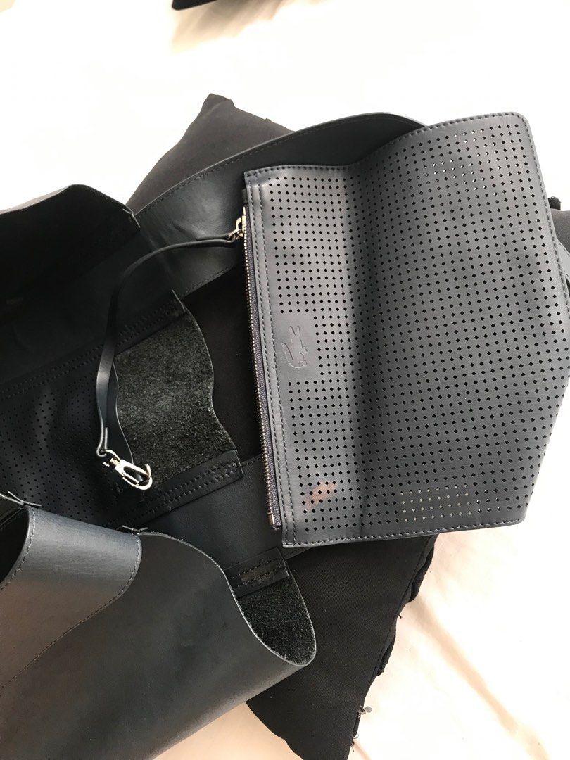 Lacoste Soft Leather Hand/Tote Bag (M) (Category: Luxury Bags & Wallets) located in Makati City. Submitted by laineycops (Listing ID 1328342978, Image 2). Description: w detachable pouch 2 compartments (incl of the pouch) min. wear as seen on photos 9.5-10in shoulder drop 10.75-11in length 17in wide 6in width at the bottom sold as is ***see about on profile rfs: decluttering.